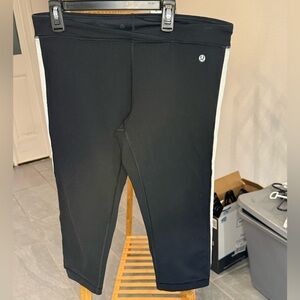 Lululemon Cropped Black Capri Leggings with white stripe, size 12